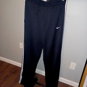 Nike basketball pants 2 pockets and zipper on both leg  bottoms